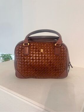 Authentic vintage Bally woven leather top-handle bag in a rich brown.